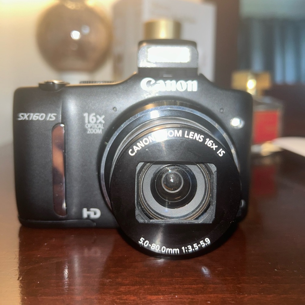 Canon Camera with Case and AV Output Cord